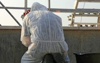 Asbestos abatement specialist on a job