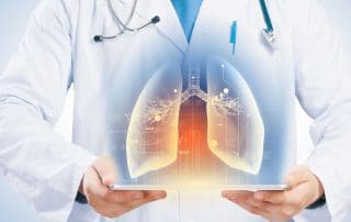 Close-up of doctor s body with tablet pc in hands