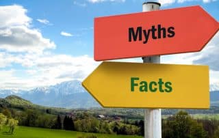 Street sign reading facts and myths