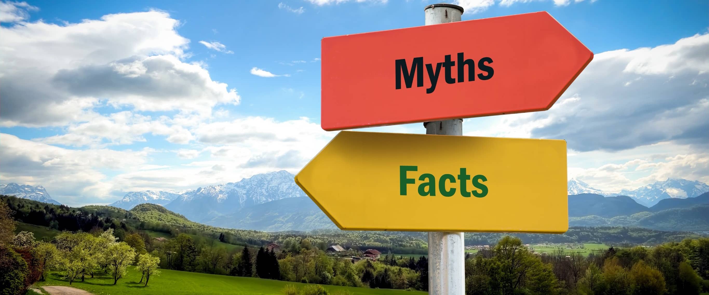 Street sign reading facts and myths