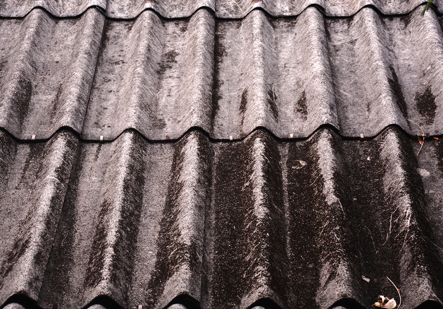 Asbestos roof tiles