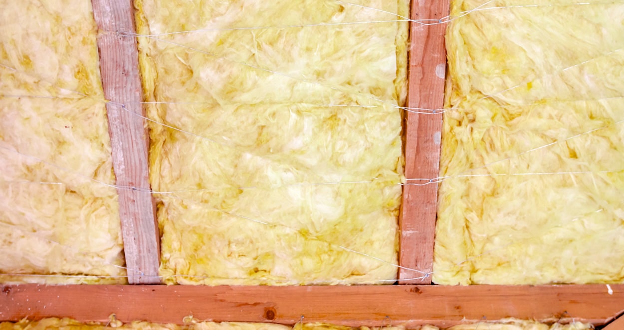 Rafters of a home packed with insulation